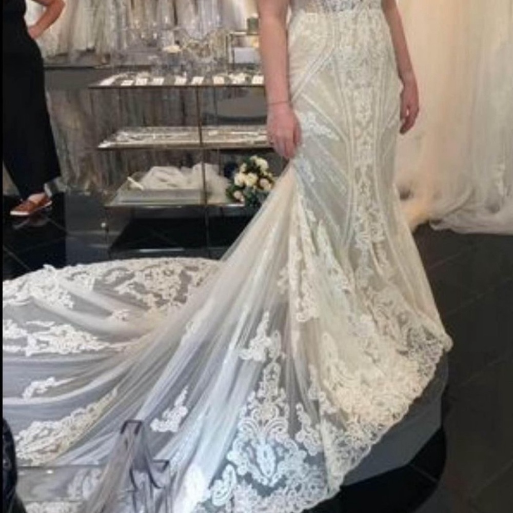 Champagne color A-line fitted wedding dress.